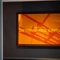 A close up view of a bright orange picture of scaffholding, featuring the words "Welcome to Devonshire Arms", on a wall inside the pub.