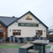 exterior beer garden of a pub with a seating area