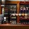 A close up view of the beer taps on the bar inside The White Hart in Frimley.