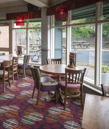 Interior dining area of a pub.