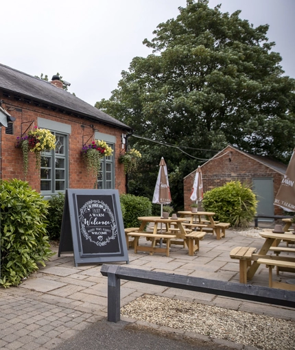 External view of a pub and beer garden
