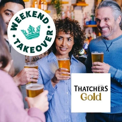 A banner featuring the square, white Thatchers Gold logo and the circular Greene King Weekend Takeover logo with a green crown, on an image of four people in a pub, holding glasses of cider.
