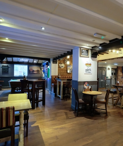 interior of the restaurant with TV