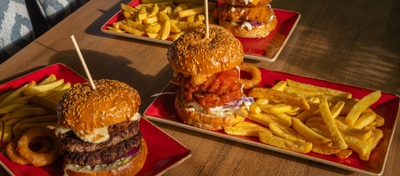 A served selection of burgers  available on the Hungry Horse Autumn Winter menu.