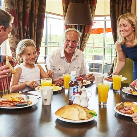 A family enjoying breakfast