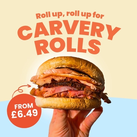 A banner promoting Carvery Rolls available at Farmhouse Kitchen venues. The banner features an image of a hand holding a carvery roll, and the words "Roll up, roll up for Carvery Rolls" and "from £6.49". 
