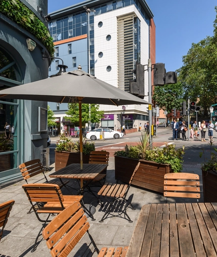 A beer garden outside of a pub