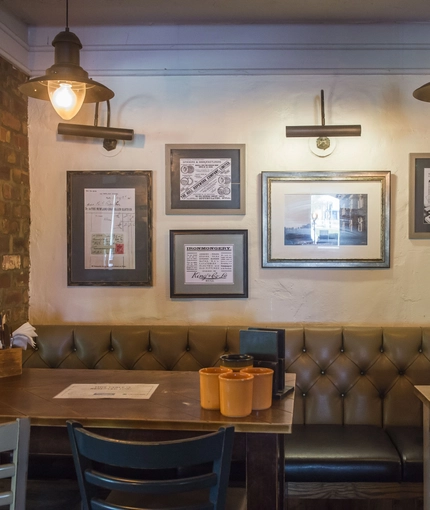Interior dining area of a pub.