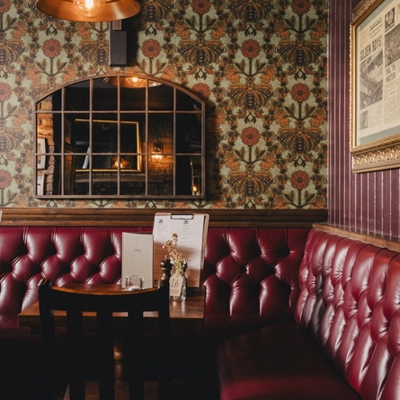 The interior restaurant and seating area at the Three Tuns.