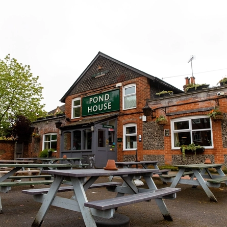 Exterior shot of the pubs facade and beer garden