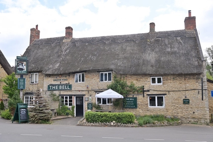 An exterior shot of the main entrance and facade at the Bell (Odell).