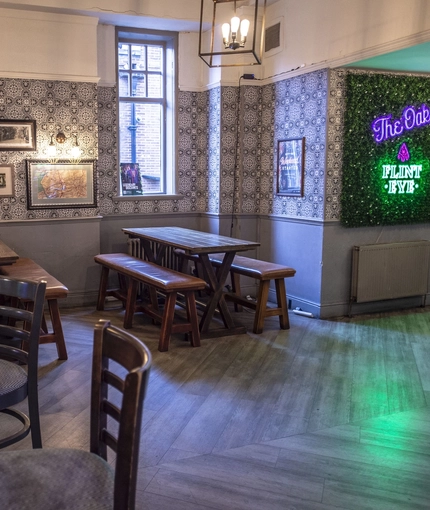 Interior image of the venue with ambient lighting.