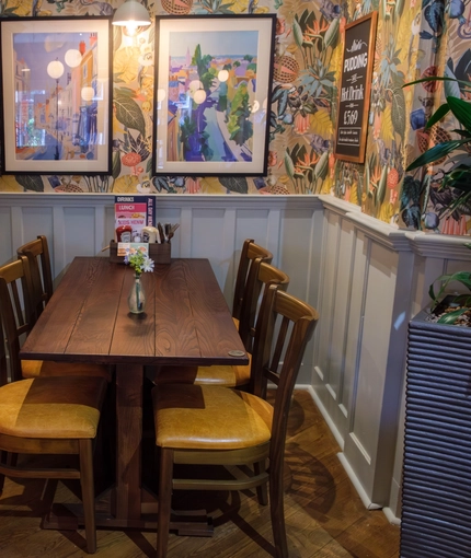 The interior restaurant and seating area at the Tudor Arms.