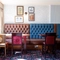 Interior dining area of a pub.