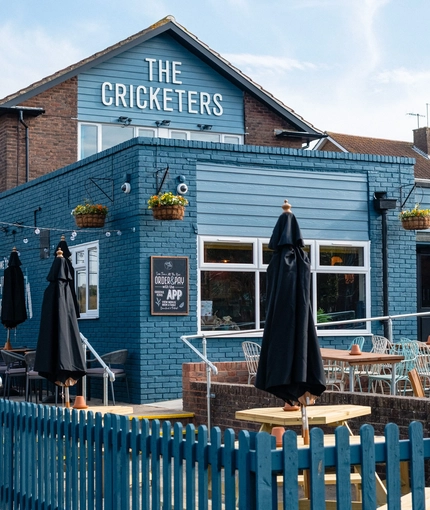Exterior and beer garden of the Cricketers pub in Southwick