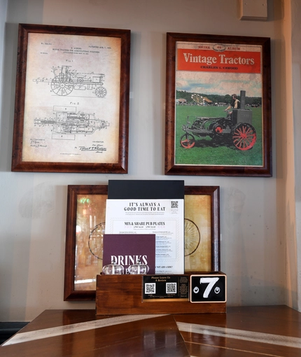 A group of historical pictures on a wall