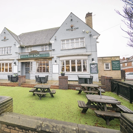 The exterior facade with beer garden and seating area at the Fox.
