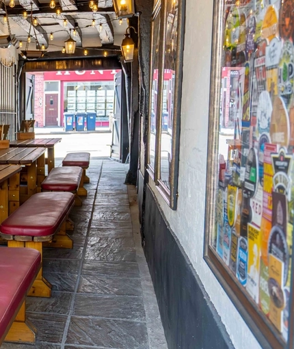 Exterior bench seating at Ye Olde Mitre in Barnet.