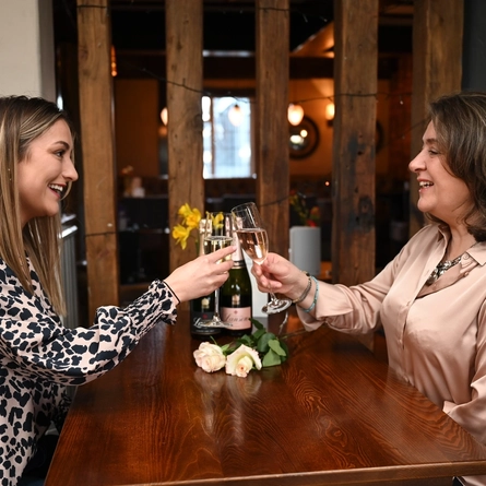 A mother and daughter celebrate Mother's Day at the pub