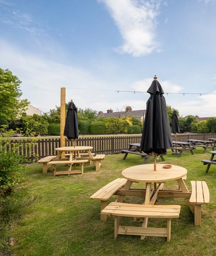 The exterior beer garden and seating area at the Black Horse.