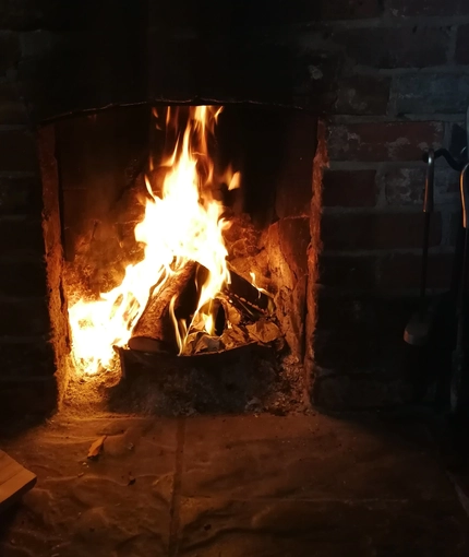 a close-up of a fireplace in a pub