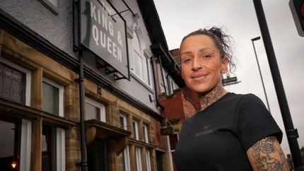 A person outside the King and Queen.
