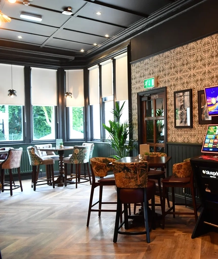 A restaurant area in a pub with pub games