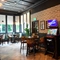 A restaurant area in a pub with pub games
