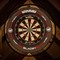 The interior pub games area focusing on a dart board available to use at the Armstrongs.