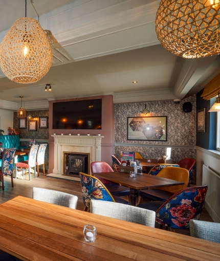 The restaurant area of the Woodman Inn.