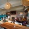 The restaurant area of the Woodman Inn.