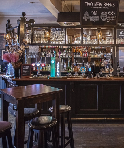 interior bar with restaurant and seating area