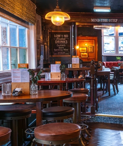 The bar and interior seating area inside The Sussex Arms.