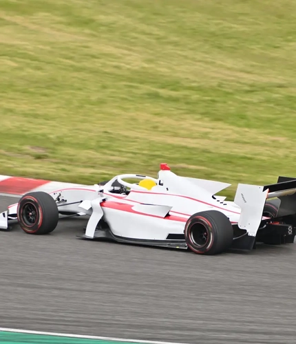 A Formula One car racing on a track.