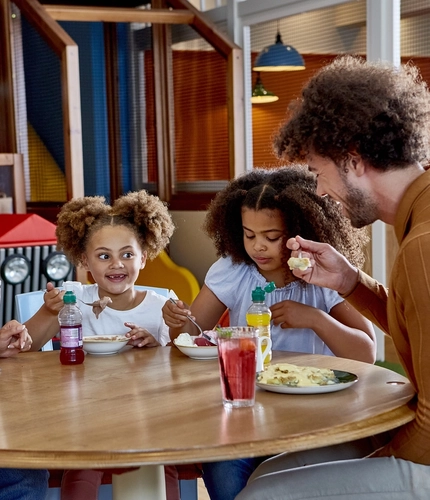 Family enjoying a meal at Farmhouse Kitchen