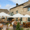The exterior facade, signage, and beer garden seating area of the Smiths Arms pub in Beckwithshaw.