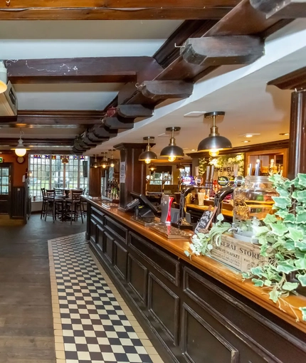 interior seating area and bar of the pub