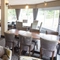 Interior dining area of a pub with a TV.