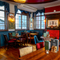 An interior restaurant seating area at the Two Chairmen in St James's, with wooden flooring, framed artwork on the walls, and a fireplace.