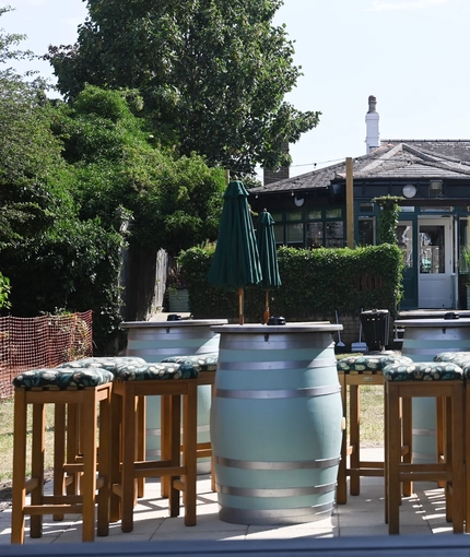 The exterior beer garden seating area with the venue in the background at The Yorkshire Grey.