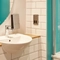 The interior of one of the hotel room bathrooms at The Churchill.