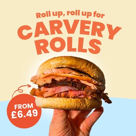 A banner promoting Carvery Rolls available at Farmhouse Kitchen venues. The banner features an image of a hand holding a carvery roll, and the words "Roll up, roll up for Carvery Rolls" and "from £6.49". 
