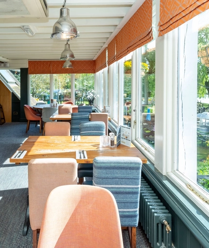 Interior dining area of a pub.