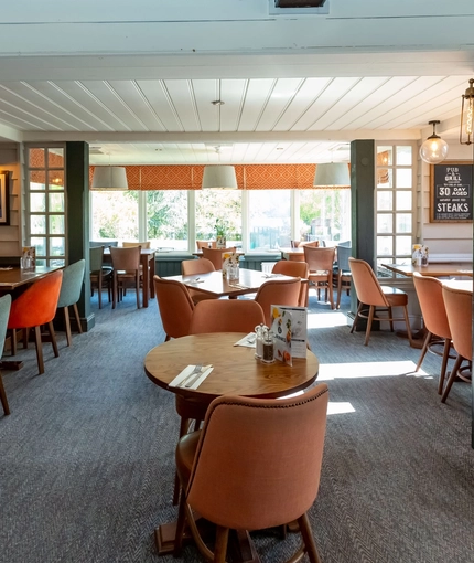 Interior dining area of a pub.