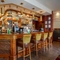 Interior bar of a pub with stools.