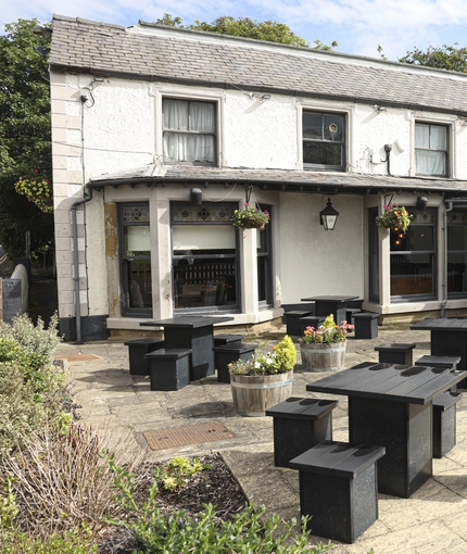 External view of a pub and beer garden