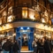 An image of crowds of people stood outside the venue during the evening The Kings Stores.