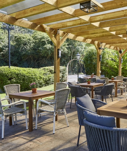 The exterior beer garden seating area with partial undercover section at The Drum and Monkey.