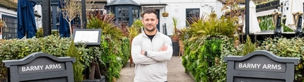 Danny Care outside a Greene King Sport Pub.
