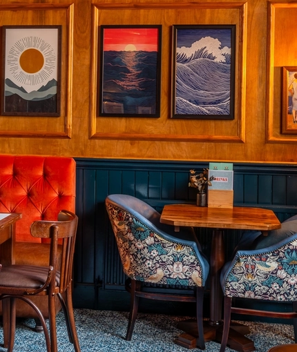 The interior restaurant seating area at The Sussex Arms.